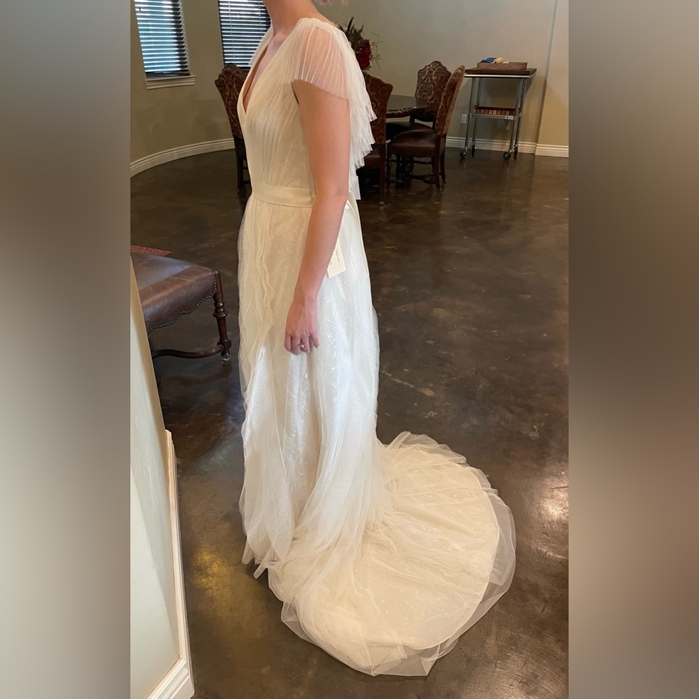 Beautiful Vera Wang wedding dress from David’s Bridal. Model is a size 0-2. - Picture 4 of 6